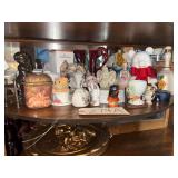 LARGE ASSORTMENT OF SUNDRIES TO INCLUDE PORCELAIN FIGURAL BELL, OTHER BELL, NATIVE AMERICAN SHAKER, HATPIN HOLDERS, TOOTHBRUSH HOLDER, VINTAGE KRYSTAL HAMBURGER MUG, ANGEL PLAYING INSTRUMENT, PINK MON