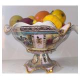 LARGE VINTAGE FLUTED FOOTED CENTER BOWL WITH PORTRAIT AND FLORAL DECOR AND GOLD-TONE DETAIL; PLASTIC FRUIT INCLUDED