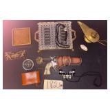 6 X 15 MANON FIELD GLASSES IN LEATHERETTE CASE; SMALL OVAL LIPSTICK CASE; SMALL BRASS-TONE PILL BOX; FOOTED AND HANDLED BRASS TRAY WITH GLASS INSERTS; BEADED SQUARE COASTERS; APPEARS TO BE BRASS ALADD