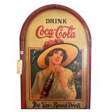 LARGE VINTAGE ARCHED-TOP COCA-COLA WALL SIGN THAT APPEARS TO BE PAINTED WOOD, MODELED AFTER ANTIQUE ADVERTISING WITH THREE-DIMENSIONAL COKE BOTTLE; APPROX. 3 FT. TALL X 2 FT. WIDE