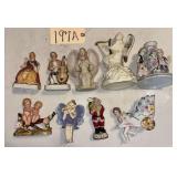 LOT OF 9 VINTAGE FIGURINES TO INCLUDE ANGELS, COLONIAL MAN AND WOMAN, DECORATIVE CANDLEHOLDER, AND SANTA