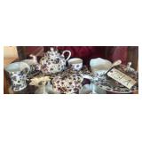 12 PIECES OF PURPLE FLORAL CHINA/PORCELAIN; FROM TOP SHELF OF CHINA CABINET