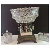 HEISEY CRYSTAL BOX WITH KNOBBED LID, ETCHED OR CUT-GLASS JAR WITH SPOON, AND CENTERPIECE WITH BRONZE-TONE METAL AND MARBLE BASE, ORNATE GLASS BOWL, AND HANGING PRISMS