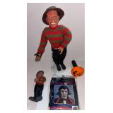 LARGE FREDDY KRUEGER PULL-STRING TALKING DOLL FROM “A NIGHTMARE ON ELM STREET,” JUST UNDER 18" TALL; MOLDED 1983 FREDDY KRUEGER DOLL, APPROX. 8" TALL; VAMPIRE WIG; JACK-O