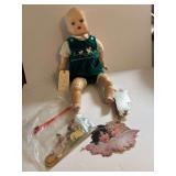 VINTAGE DOLL WITH OPEN/CLOSE EYES, CLOTH BODY, AND PLASTIC/COMPOSITION-TYPE ARMS AND LEGS, APPROX. 25" TALL, MARKED “MADE IN USA” AND NUMBERED 750; IN GOOD OVERALL CONDITION, WITH MARKING/DISCOLOR