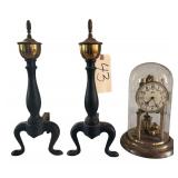 PAIR OF VINTAGE BRASS & CAST IRON ANDIRONS; SCHATZ GLASS DOME ANNIVERSARY CLOCK (AS-FOUND