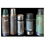 5 VINTAGE VACUUM BOTTLES: 2 ALADDIN STANLEY, 2 OTHER STANLEY, 1 RUGGED AMERICAN