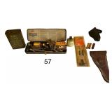 VINTAGE OUTERS SHOTGUN CLEANING KIT, OUTERS UNIVERSAL RIFLE CLEANING ROD, MILITARY RIFLE BORE OIL CAN, U.S. LEATHER HOLSTER, OTHER SMALL HOLSTER, 2 FEDERAL 20 GA. SHOTGUN SHELLS, VINTAGE 12 GA. PAPER 