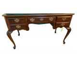 QUEEN ANNE STYLE SOLID WOOD 5-DRAWER DESK W/ CABRIOLE STYLE LEGS APPROX. 30.25” TALL X 52” WIDE X 26” DEEP