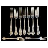 SET OF 7 WALLACE ROSE POINT STERLING SILVER DINNER FORKS AND 2 SMALLER FORKS, 9 TOTAL, APPROX. 12.28 TROY OZ., 382.1 GRAMS