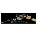 LARGE SIZE WOODEN DUCK DECOY (HAIRLINE ACROSS BACK); 3 DUCK THEME COASTERS; 2 COMPOSITE SWAN FIGURINES; DUCK PIN DISH; 9 MINIATURE SIZE DUCK FIGURINES