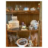 CLEAR STEM GLASSES, CLEAR GLASS DECANTERS W/ STOPPERS, CUPS AND SAUCERS, DINNER PLATES, DESSERT PLATES, BOWLS, PLATTERS, ELECTRIC COFFEE URN, WEDGWOOD VASE, MUSIC BOX, OIL LAMP, 2 POTTERY STYLE PLANTE