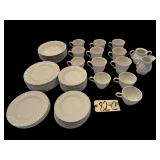 APPROX. 50 PIECES OF CREAM-COLOR SWIRL PATTERN CHINA TO INCLUDE NIKKO JAPAN TABLEWARE & UNMARKED: CREAM AND SUGAR, 12 COFFEE MUGS, 7 BOWLS, 12 SALAD PLATES, 17 SAUCERS - MOST PIECES IN GOOD CONDITION