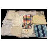 LARGE LOT OF ASSORTED FABRICS, LACE PLACEMATS, TABLECLOTHS, TABLE RUNNERS, ETC.