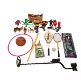 ASSORTMENT OF CHILDREN’S TOYS TO INCLUDE CARS, TRUCKS, DUMP TRUCKS, DOLLS, FIGURES, TOY GUNS, STAGECOACH, HULA HOOP, 2 VINTAGE TENNIS RACQUETS, WIFFLE BALL BAT, BASKETBALL, PLASTIC HORSESHOES, TY BE