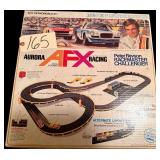 VINTAGE AURORA AFX RACING PETER REVSON RACEMASTER CHALLENGER HO SCALE SLOT CAR RACING SET (NOT CHECKED FOR COMPLETENESS)