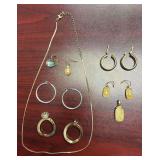JEWELRY LOT TO INCLUDE; GOLD FILLLED AND PLATED EARRINGS , A PENDANT W/ MATCHING EARRINGS, 2 ODD EARRINGS, 1 PAIR OF SILVER COLOR EARRINGS