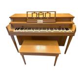 WINTER PIANO AS-FOUND (KEYS DAMAGED); WOODEN PIANO BENCH CHOCK-FULL OF MUSIC; FRINGED PATTERN RUG APPROX. 72” X 48”