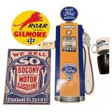 3 METAL AUTOMOTIVE ADVERTISING SIGNS: GILMORE, FORD, SOCONY; FORD MOTORSPORTS MUG; FORD THUNDERBIRD MUG