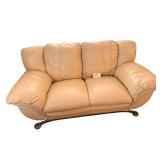 FAUX LEATHER LOVESEAT - APPROX. 70” FROM OUTER ARM TO OUTER ARM - MATCHES LOT #91