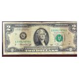 VINTAGE BICENTENNIAL 1776-1976 UNITED STATES TWO DOLLAR BILL IN PROTECTIVE HOLDER. CIRCULATED, SOME STAINING/ DISCOLORATION.