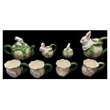 8 CERAMIC RABBIT AND CABBAGE PATTERN PIECES: 4 MUGS, SAUCER, CREAM AND SUGAR, WATER PITCHER