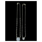 2 GOLD-TONE CHAIN NECKLACES FEATURING ROUND GRAY DRUZY TYPE PENDANTS WITH SMALL BEAD ACCENTS.
