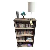 BOOKCASE W/ ELECTRIC LAMP AND ASSORTED CDS TO INCLUDE ABBA, EARTH WIND AND FIRE, THE BYRDS, THE TAMBOURINE MAN, COLLECTIVE SOUL, COUNTRY STRONG, ALAN JACKSON, JANET JACKSON, FLEETWOOD MAC, GENESIS, LE