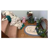 GRAPEVINE WREATH, 2 CHALK RABBIT FIGURINES, PAIR OF CERAMIC RABBIT BOOKENDS, LARGE FABRIC RABBIT DOLL W/ FLORAL DRESS, RUSTIC BIRDHOUSE W/ ARTIFICIAL BLUE FLOWERS AND IVY, OVAL BRAIDED RABBIT-MOTIF RU