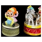 2 VINTAGE CERAMIC JAPANESE-STYLE MUSIC BOXES: 1 RAGGEDY ANN AND ANDY, 1 CAROUSEL THEME