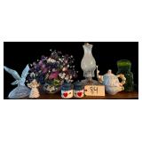 CLEAR GLASS BIRD FIGURINE, CERAMIC “KITCHEN ANGEL” FIGURINE, ARTIFICIAL FLORAL ARRANGEMENT IN CERAMIC VASE, 2 HEART-MOTIF CERAMIC CANISTERS, GLASS OIL LAMP W/ CHIMNEY, MUSHROOM-MOTIF CERAMIC LIDDE