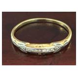 VINTAGE TWO-TONE GOLD BAND, MARKED 14K, POSSIBLY FEATURING SMALL DIAMOND ACCENTS OR GEOMETRIC ENGRAVING ALONG A WHITE GOLD CENTER CHANNEL. SIZE 6 1/2, WEIGHS APPROX 1.3 GRAMS INCLUDING STONES