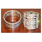 TWO MULTI-STRAND 925 STERLING RINGS, 1 WITH 7 STANDS AND CLEAR STONES, THE OTHER IS 3 BANDS AND NO STONES. APPROX 12.0 GRAMS TOTAL, SIZES 6 AND 7.