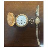 TWO ANTIQUE GOLD-FILLED WATCHES, AS-IS. 1 IS A LADY’S ELGIN WRISTWATCH, THE OTHER IS A TRENTON POCKET WATCH WITH SCROLLED CASE, CHIPPED / CRACKED PORCELAIN FACE, GLASS MISSING, HANDS MISSING, FOR PA