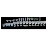 4 MARTINI GLASSES, 5 CHAMPAGNE GLASSES, 4 WINE GLASSES, 4 SHOT GLASSES, BEER GLASS, 11 VINTAGE RAISED GRAPEVINE PATTERN STEM GLASSES W/ GOLD TRIM
