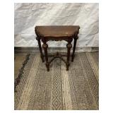Edwardian carved walnut stretcher demilune console
