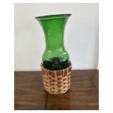 large vintage green glass wine carafe wicker baskt