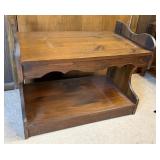WOOD TV STAND ON CASTERS