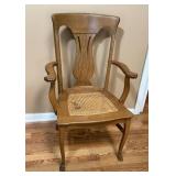 QUARTER SEWN OAK CAPTAINS CHAIR W CANE SEAT
