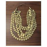 GOLD TONED MULTISTRAND DISC STATEMENT NECKLACE