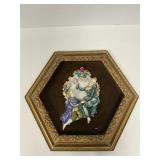A collectible decorative porcelain plaque;