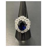 Oval Cut Blue Sapphire Sunburst Sterling Ring