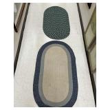 Two Small Multi Colored Braided Oval Shaped Rugs
