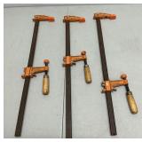 Three Painted Orange Bar Vintage Clamps