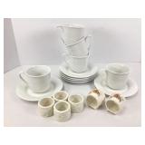 White Cup and Saucers and Napkin Rings