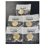 Five Uncirculated Sacagawea Dollar Coins