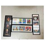 Four Black Framed Prints