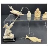 Carved Fisherman Buddhas and Boat