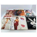 Eight Playboy Magazines