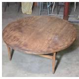 Round Wooden Coffee Table with Tapered Legs